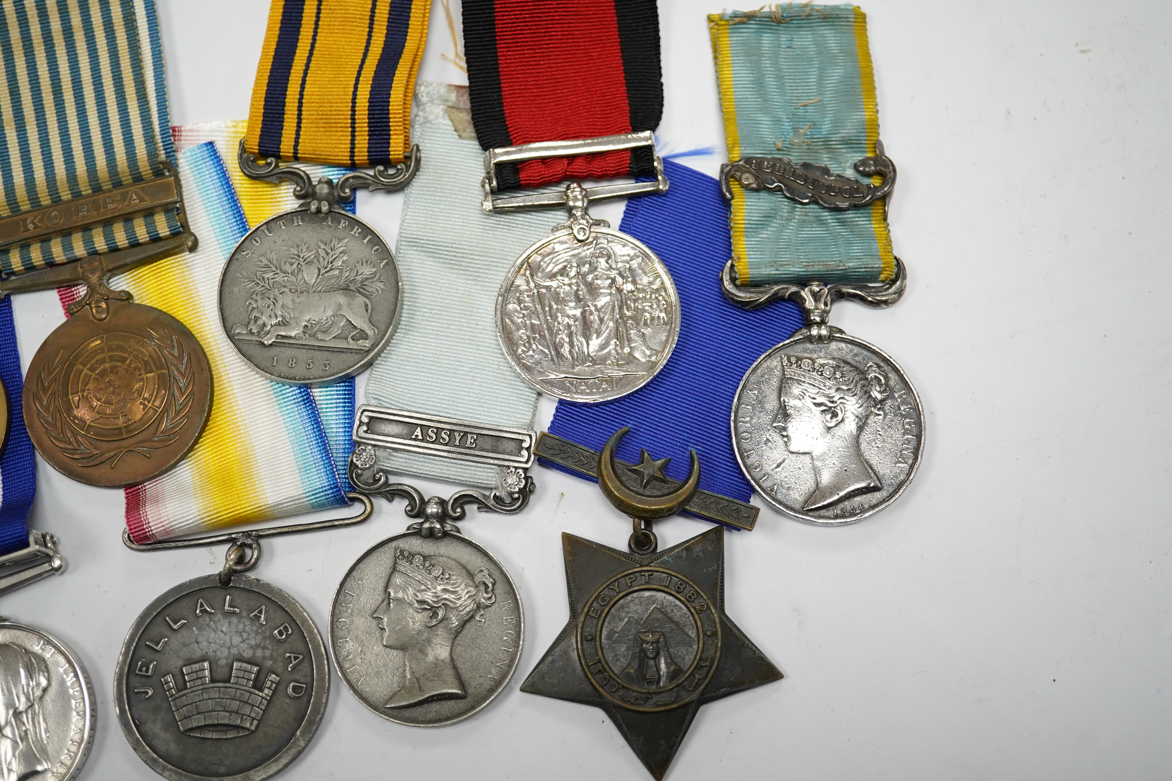 Eleven military medals, most are replica examples, etc. including